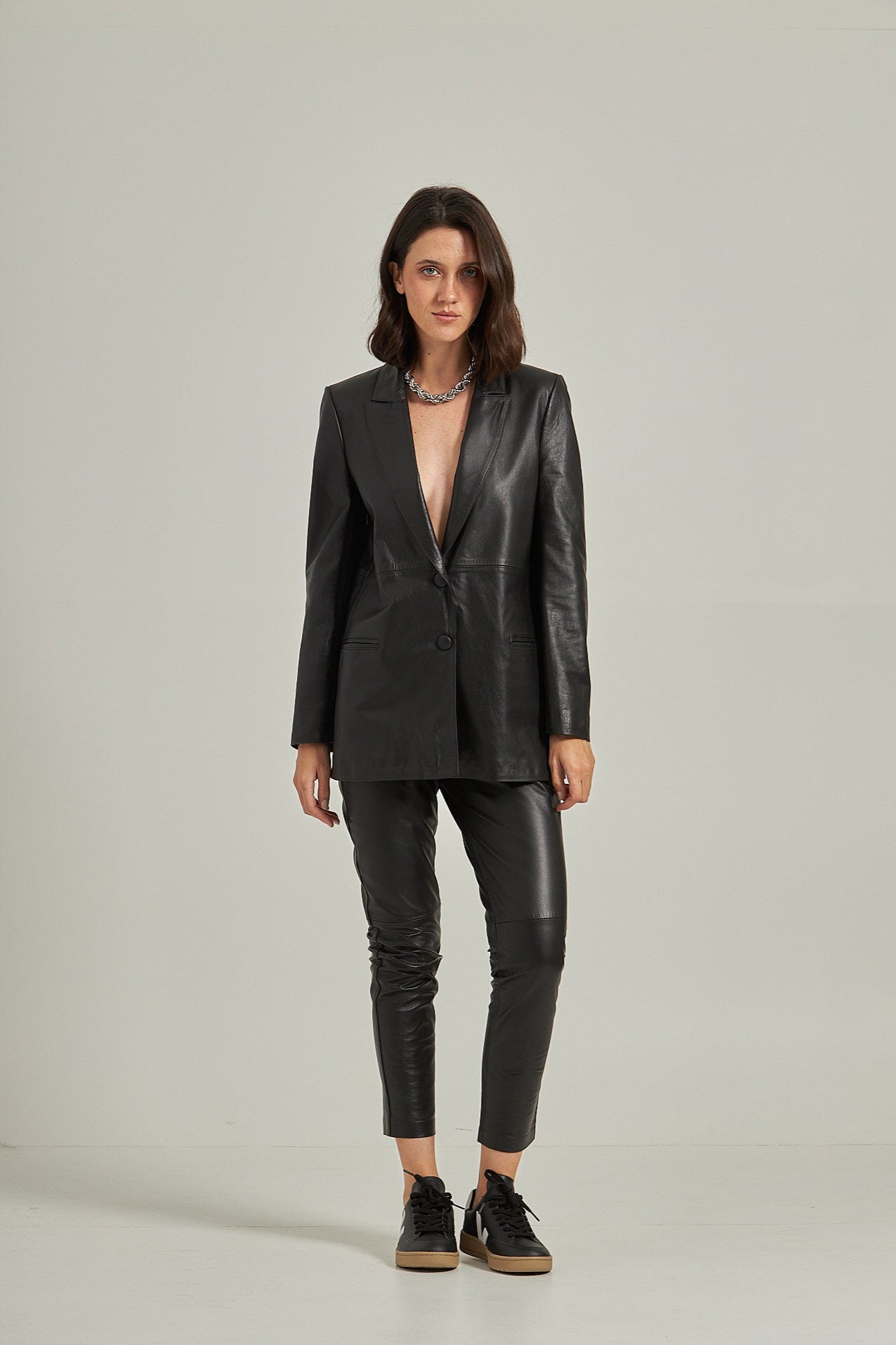 Calça couro cós elástico - Preto